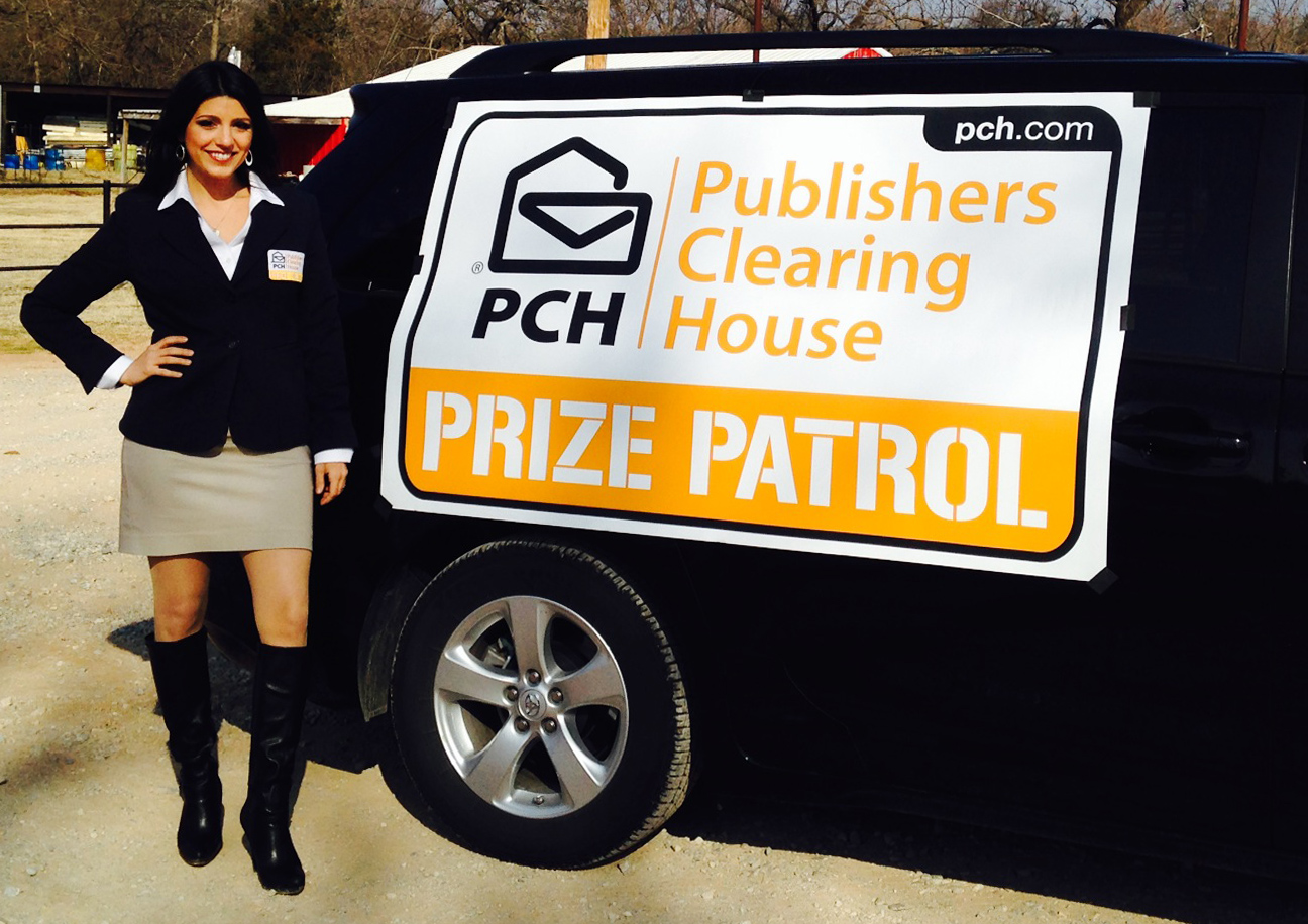 Danielle Lam with new Prize Patrol Van Sign