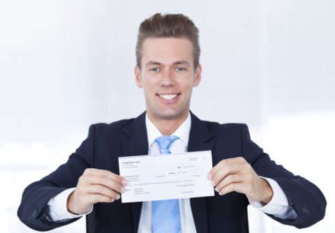 paycheck remember man leave job holding check