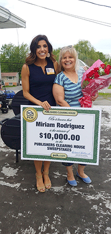 Winner of $10,000.00 Cash for School, Miriam Rodriguez with Prize Patrol member Danielle! 